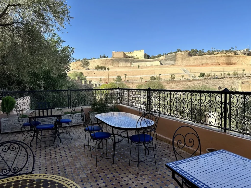 Lower terrace with North Borj and Marinid tombs Riad Layalina Fez