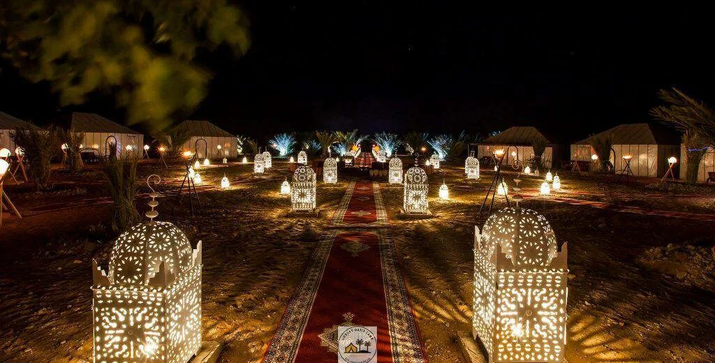 Night view of Erg Chebbi luxury desert camp, Merzouga
